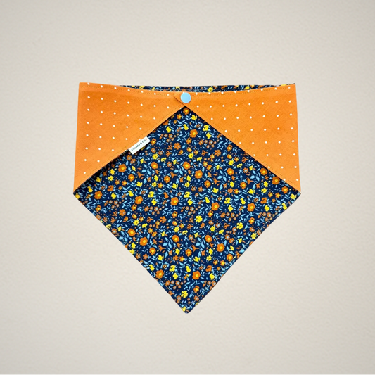Pet bandana with orange polka dots and blue floral pattern