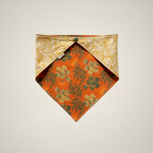 pet bandana with orange floral fabric and yellow and white paisley fabric