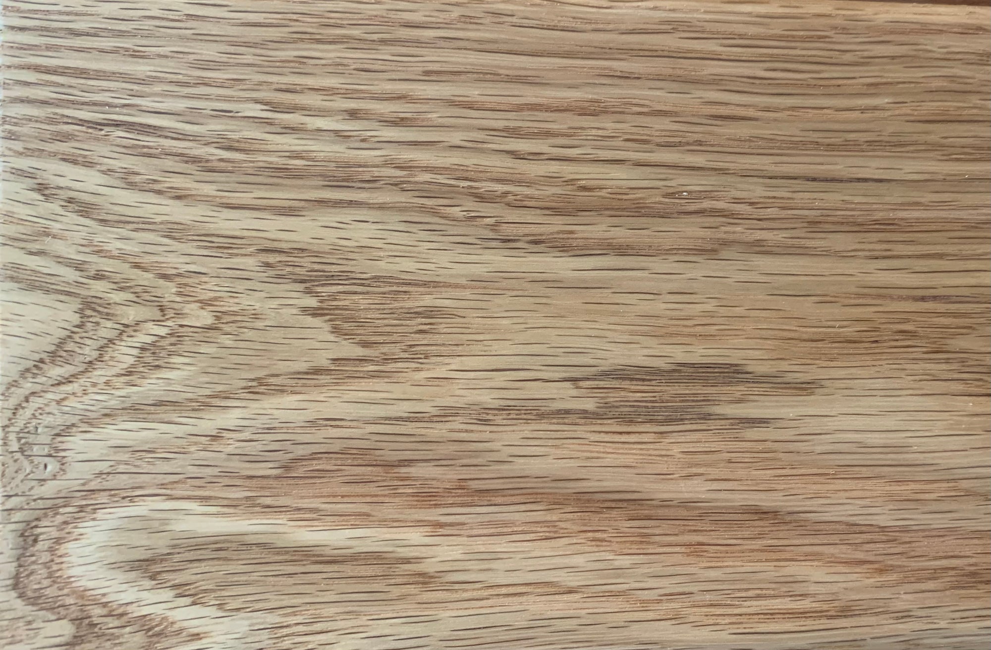 Close-up of a wooden surface with a natural grain pattern