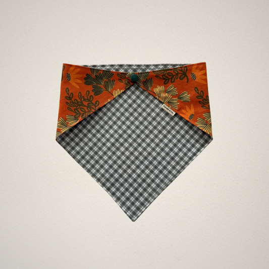 pet bandana with orange floral pattern and green and white plaid fabric
