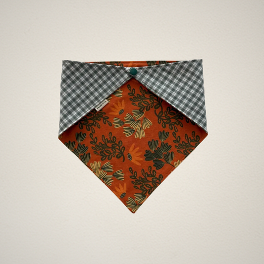 pet bandana with orange floral pattern and green and white plaid fabric