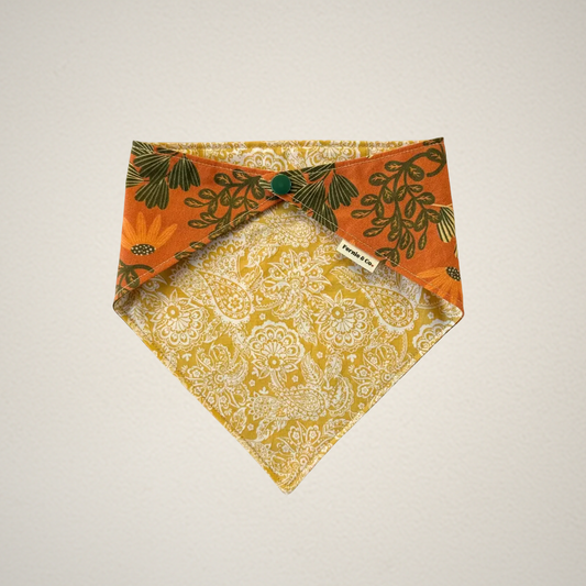 pet bandana with orange floral fabric and yellow and white paisley fabric