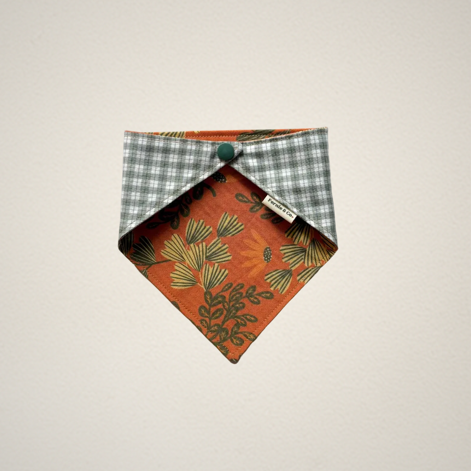 pet bandana with orange floral fabric and green and white checkered fabric