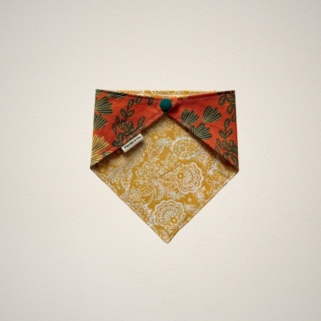 pet bandana with orange floral fabric and yellow paisley fabric