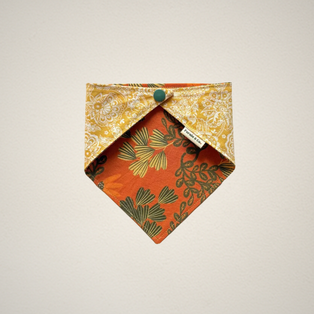pet bandana with orange floral fabric and yellow paisley fabric