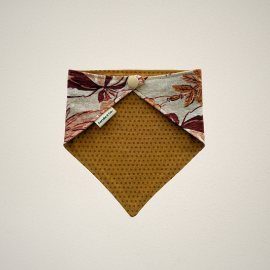 pet bandana with red and orange floral fabric and rust color dotted fabric