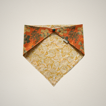pet bandana with orange floral fabric and yellow and white paisley fabric