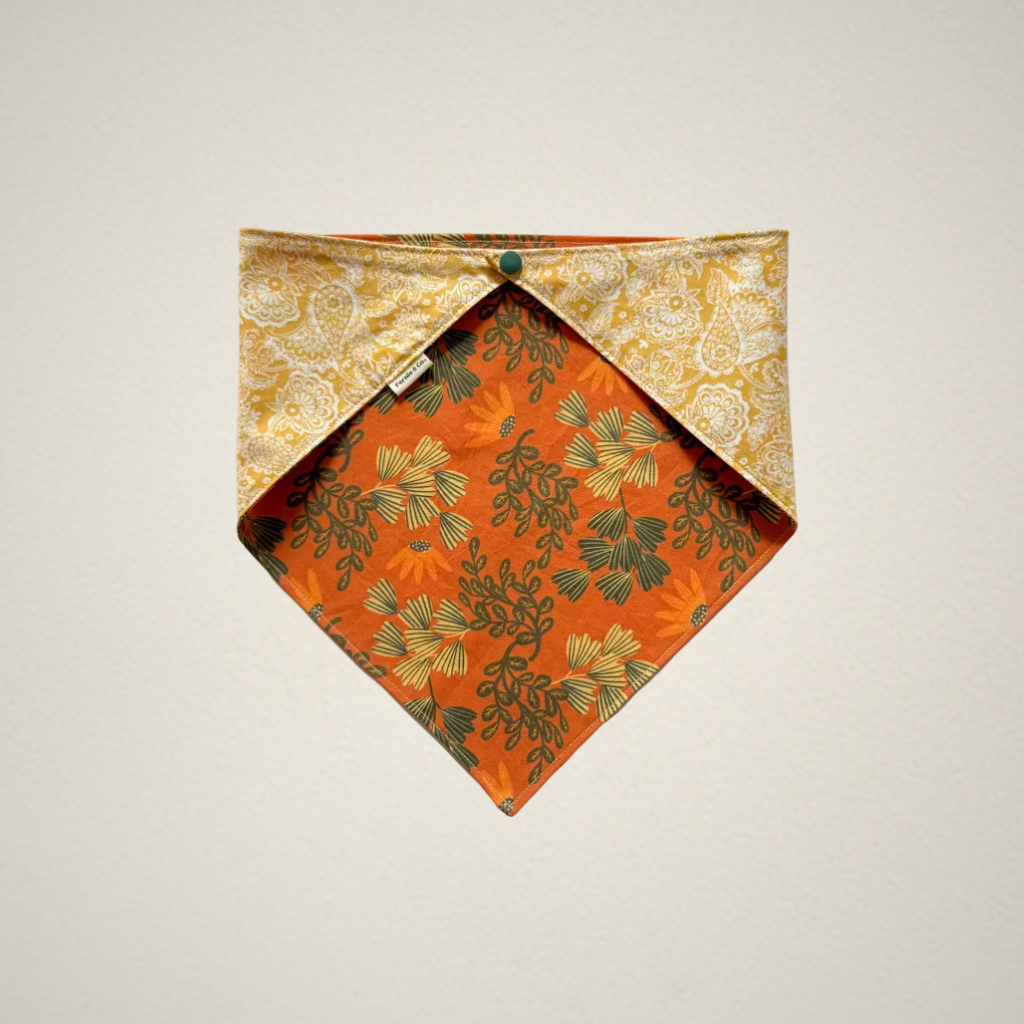 pet bandana with orange floral fabric and yellow and white paisley fabric