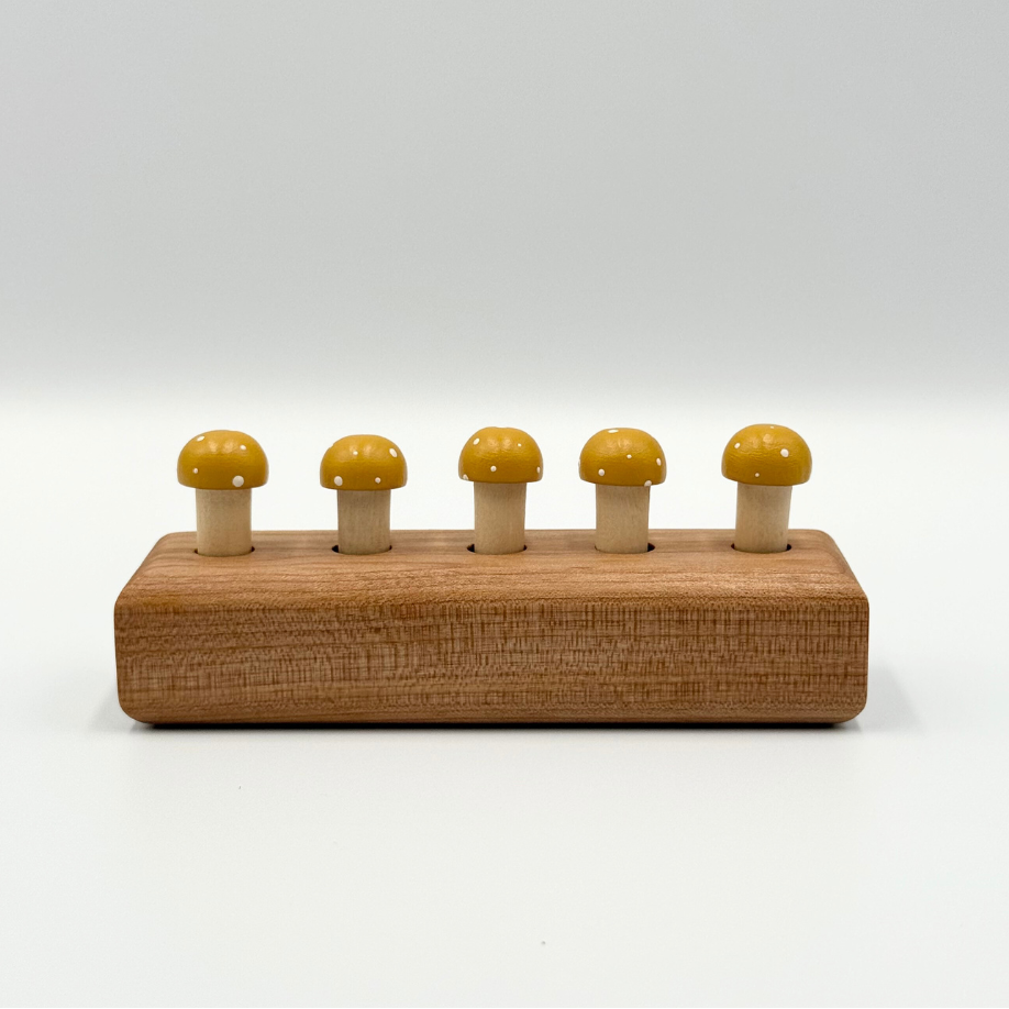 Yellow playing pegs