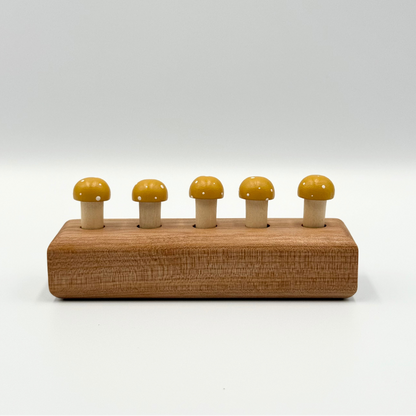 Yellow playing pegs
